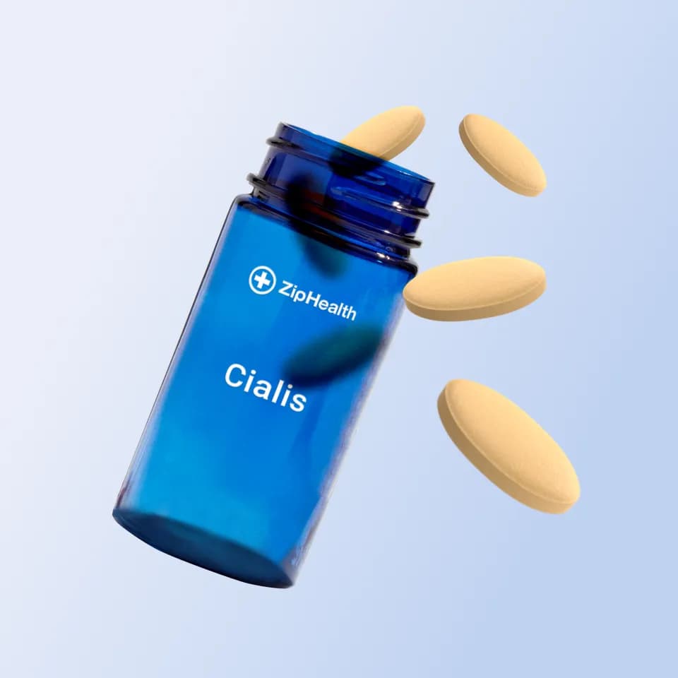 ZipHealth ED medication bottle and pills on a light blue background