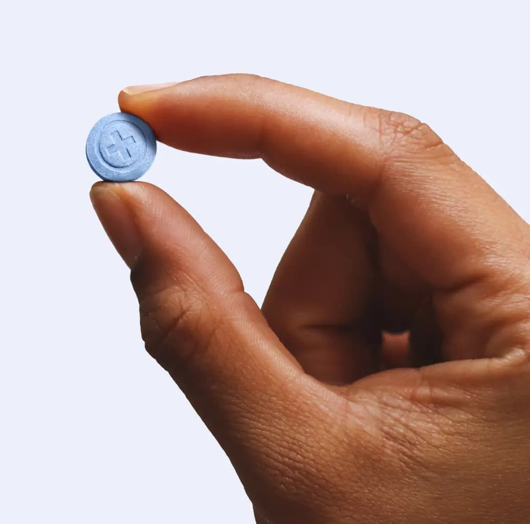 Person holding rocket tablet infront of envelope