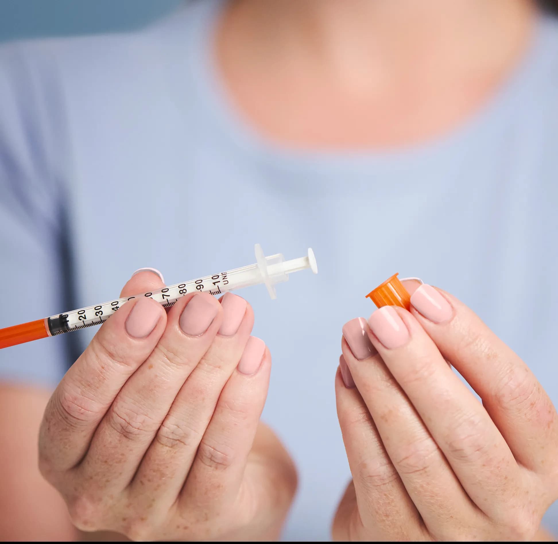 Woman holding injectable